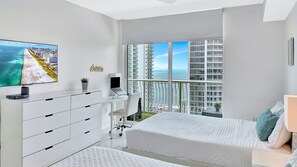 1 bedroom, desk, iron/ironing board, travel crib