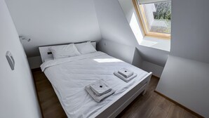 Romantic Apartment (Second Floor Attic (5)) | Living area | Flat-screen TV - Apartmani Bijelic (Zabljak)