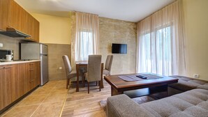 Family Apartment (High Ground Floor (1)) | Living area | Flat-screen TV - Apartmani Bijelic (Zabljak)