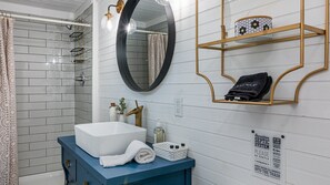 Bathtub, hair dryer, towels