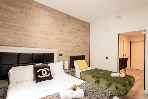 Iron/ironing board, travel crib, free WiFi, bed sheets