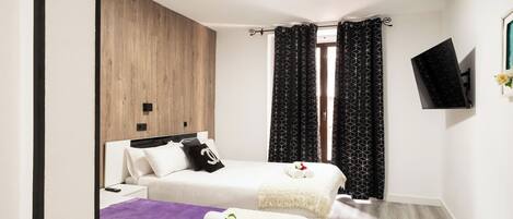 Iron/ironing board, travel crib, free WiFi, bed sheets