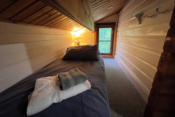 Bed 7 - Child only.(adjacent to Bed 6) Restricted headroom and window is locked.