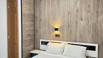 1 slaapkamer, een strijkplank/strijkijzer, reisbedje, gratis wifi