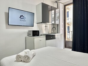 1 dormitorio, tabla de planchar con plancha, cuna de viaje y wifi gratis