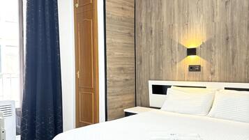 1 slaapkamer, een strijkplank/strijkijzer, reisbedje, gratis wifi