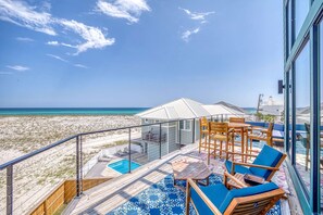 Outdoor dining - Gulf-Front Luxury Home with Private Pool, Hot Tub & Stunning Views! (Pensacola Beach)