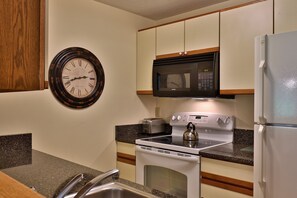Condo, 1 Bedroom | Private kitchen | Fridge, oven, coffee/tea maker, toaster - Fall Line Condos by Killington VR - 1 Bedrooms (Killington)