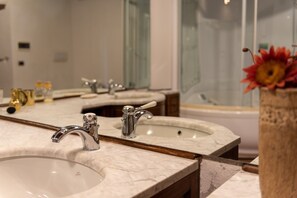 Bathtub, hair dryer, towels