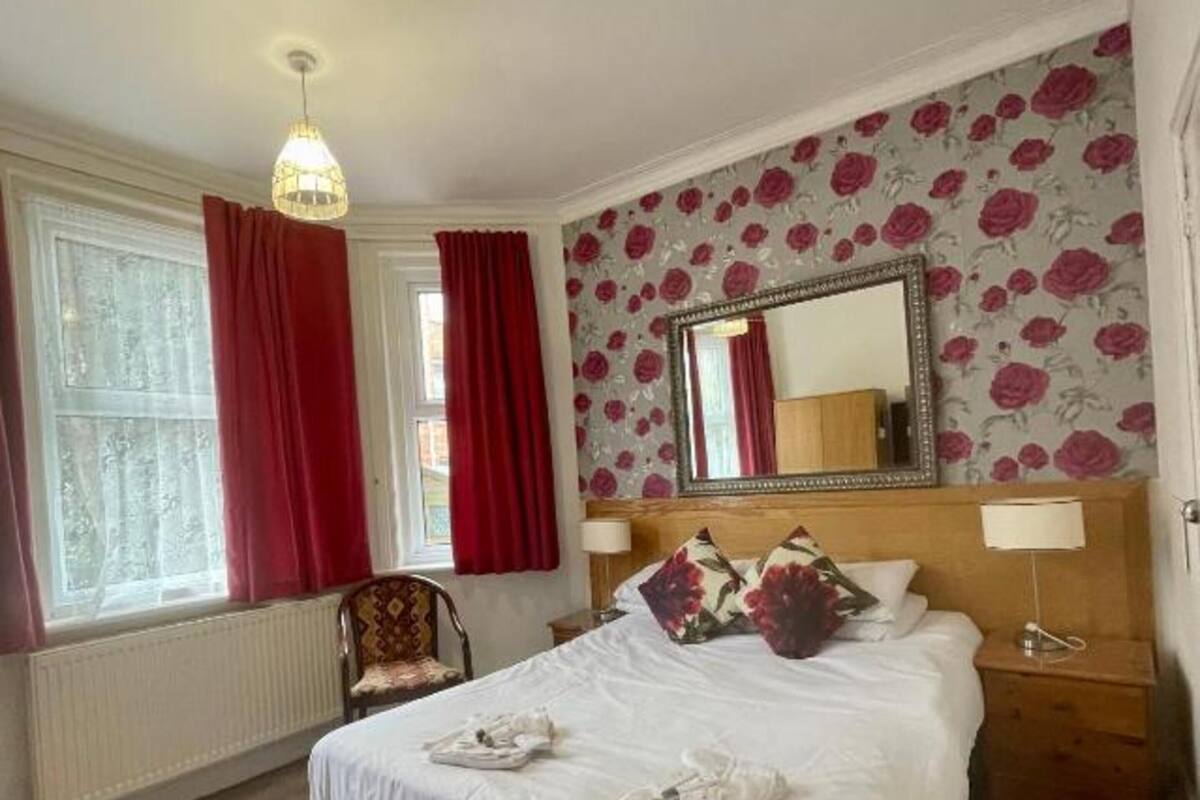 1 bedroom, desk, blackout curtains, iron/ironing board