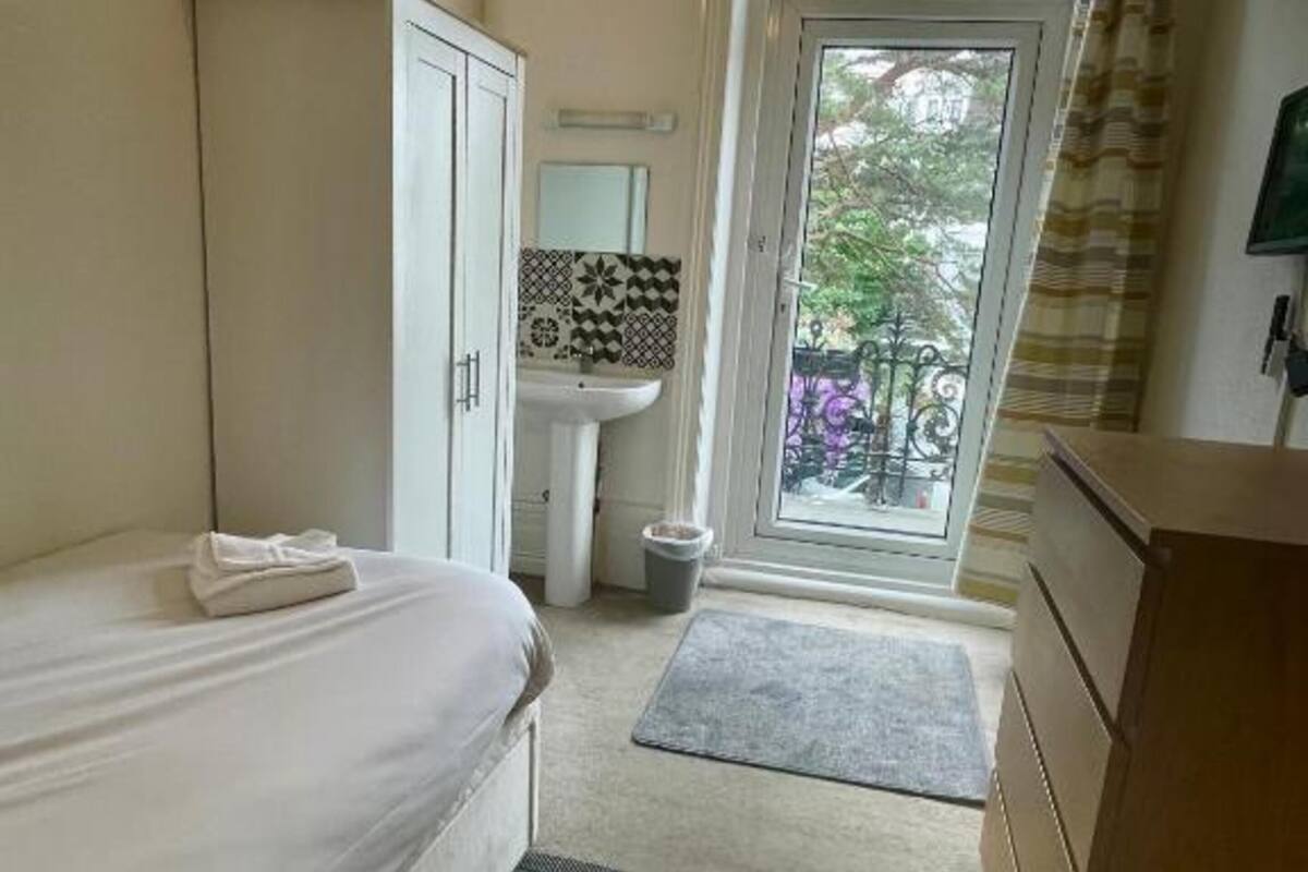 1 bedroom, desk, blackout curtains, iron/ironing board