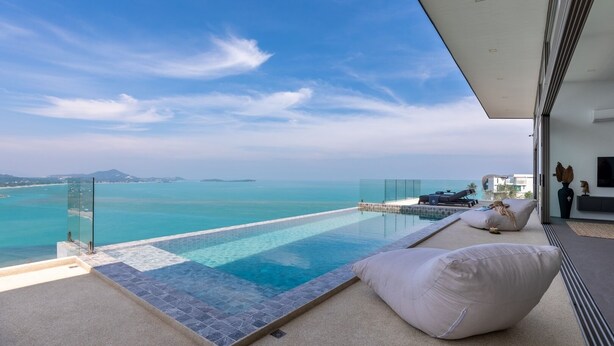 A modern infinity pool with a clear view of the ocean and distant islands. - Villa Anushka – Luxury 6BR Koh Samui Villa with Staff, Breakfast & Sea Views (koh samui)