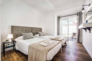 2 dormitorios, tabla de planchar con plancha, wifi y ropa de cama