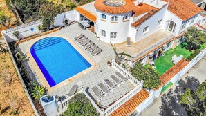 A large, white building with a circular tower and a swimming pool with sun loungers. - Villa Benicuco - Twelve Bedroom Villa, Sleeps 24 (Calp)