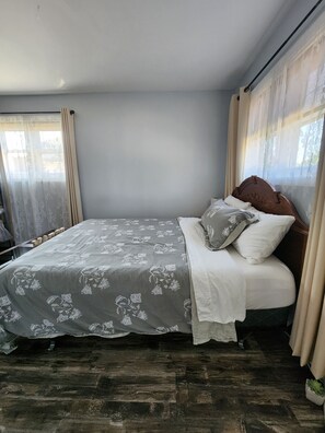 2 dormitorios, tabla de planchar con plancha, wifi gratis y ropa de cama