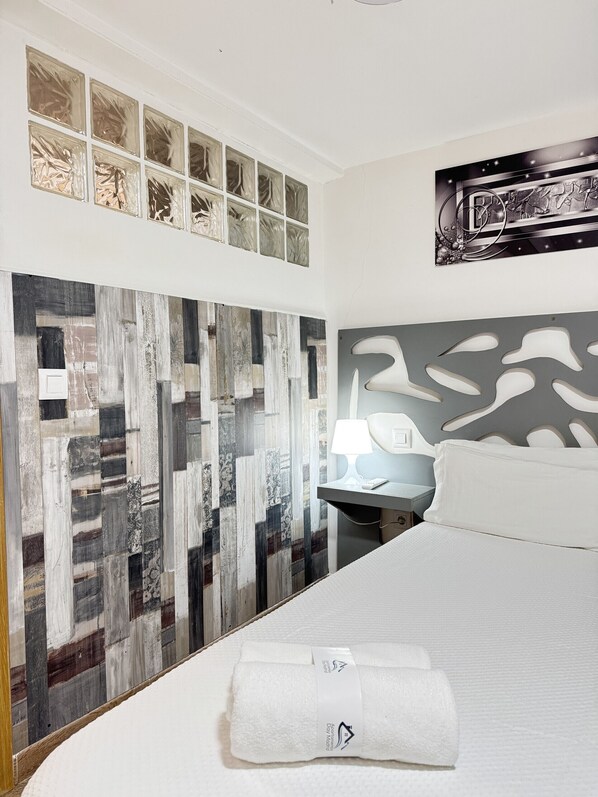 Iron/ironing board, travel crib, free WiFi, bed sheets