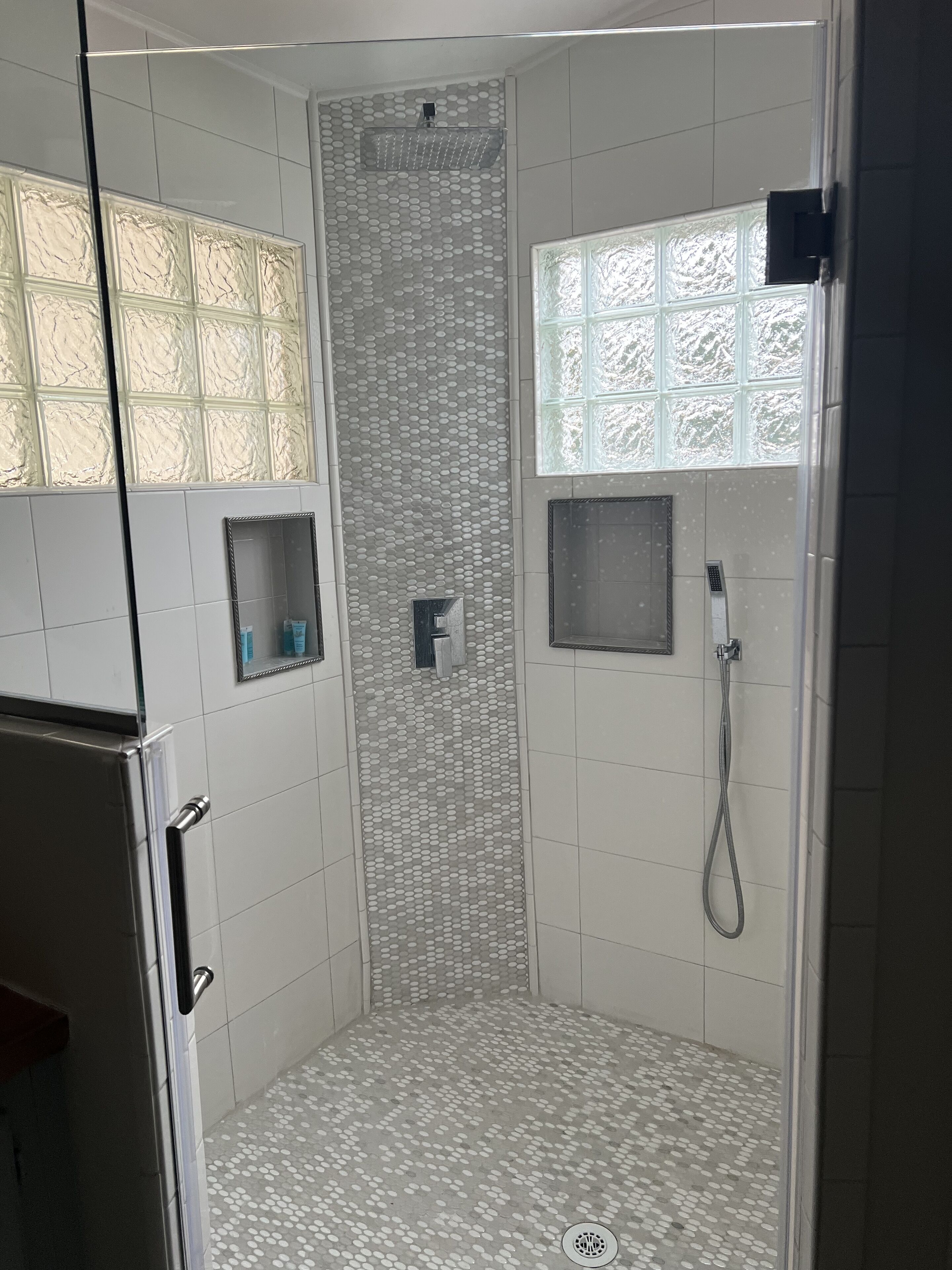 Shower, hair dryer, heated floors, towels