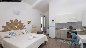 Familienstudio | Daunenbettdecken, Bügeleisen/Bügelbrett, Reisekinderbett