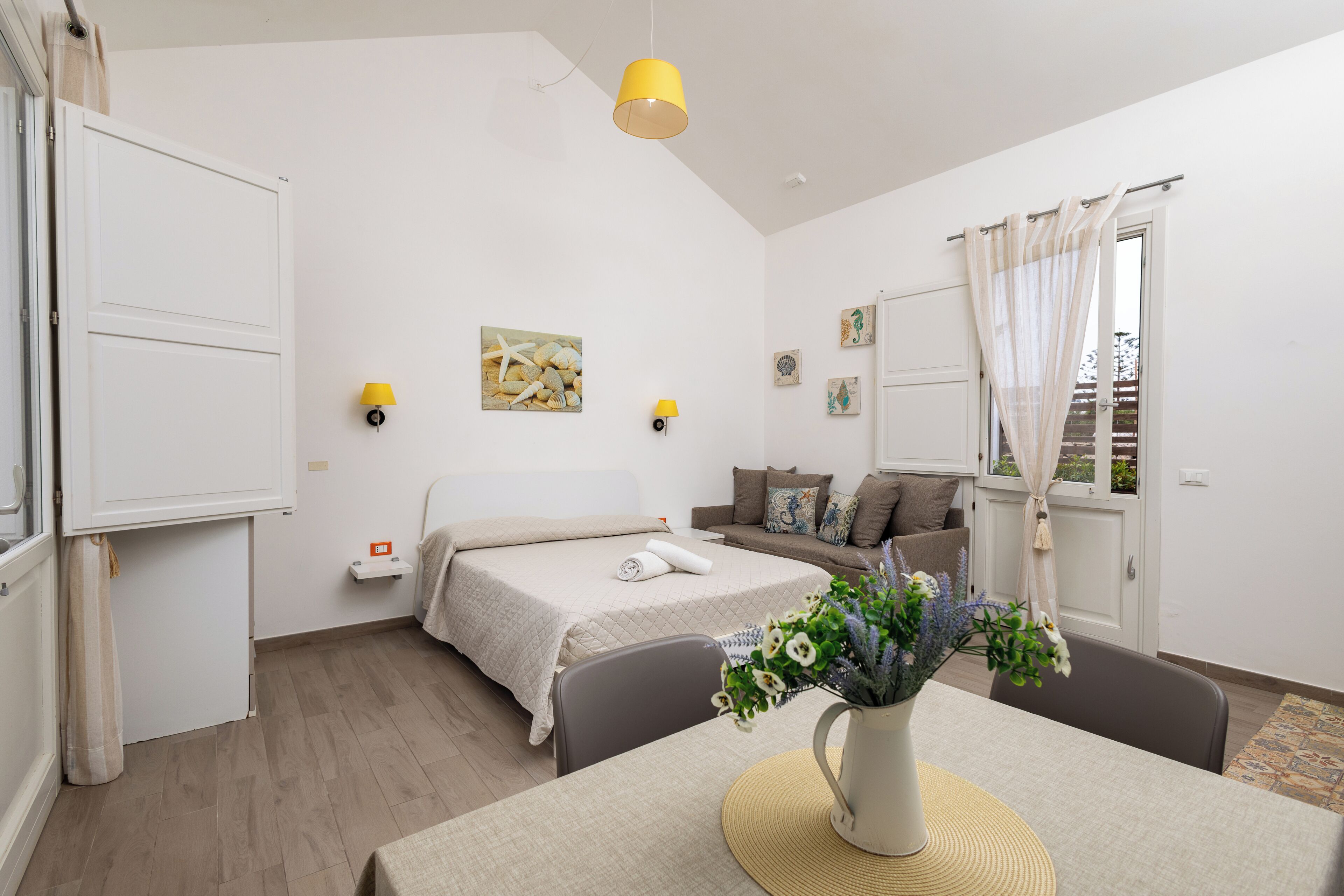 Family Studio | Down comforters, iron/ironing board, travel crib, free WiFi