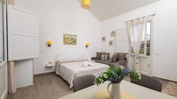 Family Studio | Down comforters, iron/ironing board, travel crib, free WiFi