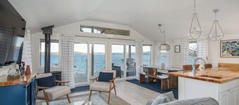 Welcome to 54 West Lake Shore Drive, a charming, single-floor home near the peaceful shores of Lake Champlain. This 1,200-square-foot residence offers 2 bedrooms (1 King, 1 Queen), 1.5 bathrooms with a shower and soaker tub. The thoughtfully designed