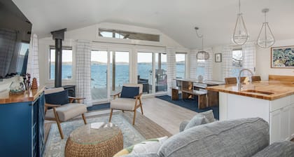 Welcome to 54 West Lake Shore Drive, a charming, single-floor home near the peaceful shores of Lake Champlain. This 1,200-square-foot residence offers 2 bedrooms (1 King, 1 Queen), 1.5 bathrooms with a shower and soaker tub. The thoughtfully designed