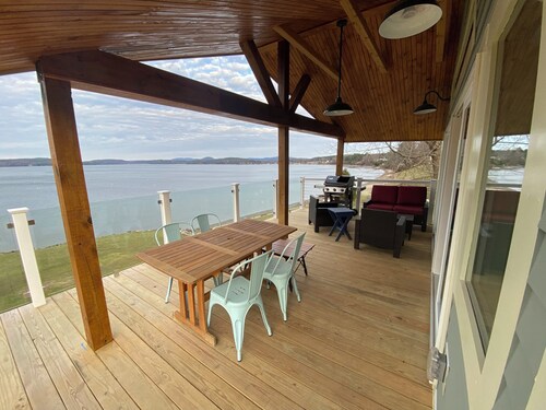 Welcome to 54 West Lake Shore Drive, a charming, single-floor home near the peaceful shores of Lake Champlain. This 1,200-square-foot residence offers 2 bedrooms (1 King, 1 Queen), 1.5 bathrooms with a shower and soaker tub. The thoughtfully designed