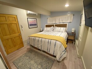 2 bedrooms - Welcome to 54 West Lake Shore Drive, a charming, single-floor home near the peaceful shores of Lake Champlain. This 1,200-square-foot residence offers 2 bedrooms (1 King, 1 Queen), 1.5 bathrooms with a shower and soaker tub. The thoughtfully designed (Colchester)