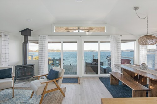 Welcome to 54 West Lake Shore Drive, a charming, single-floor home near the peaceful shores of Lake Champlain. This 1,200-square-foot residence offers 2 bedrooms (1 King, 1 Queen), 1.5 bathrooms with a shower and soaker tub. The thoughtfully designed