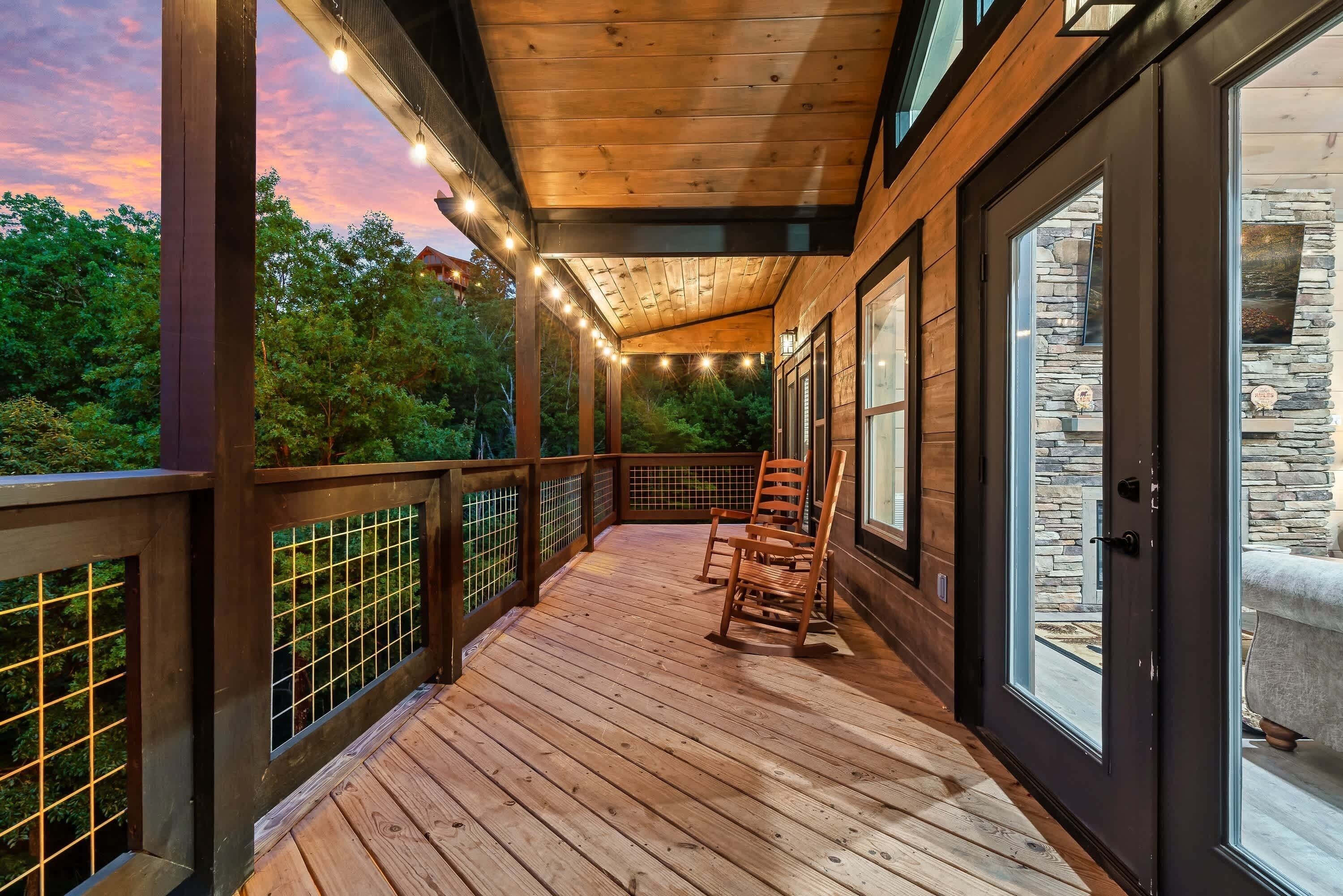 Expansive wrap-around deck with plenty of room to gather and take in the mountain views