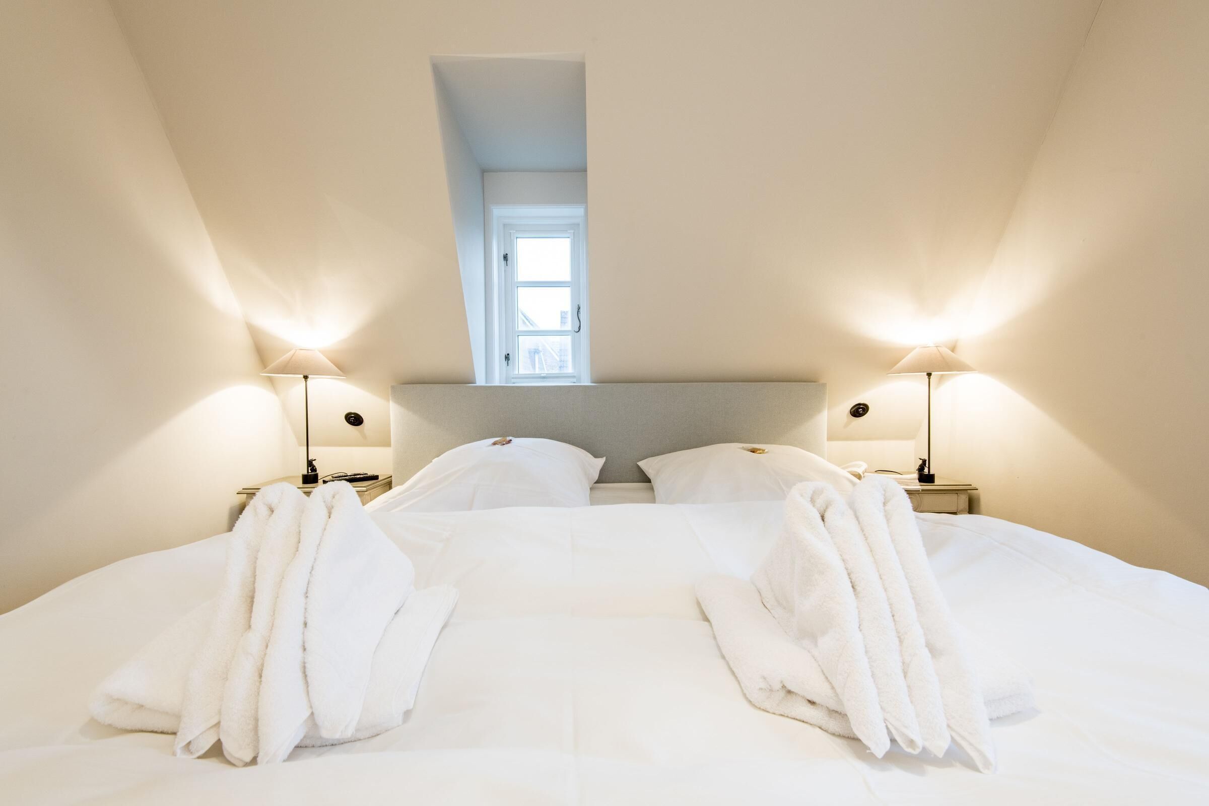 2 slaapkamers, een strijkplank/strijkijzer, gratis wifi, beddengoed