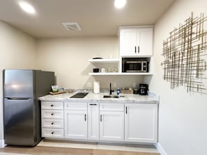 Fridge, microwave, stovetop, coffee/tea maker