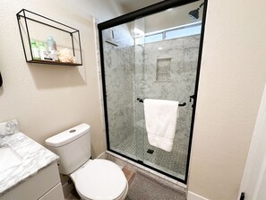 Shower, hair dryer, towels, soap