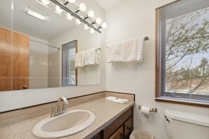 Bathtub, hair dryer, towels