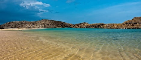On the beach, beach towels