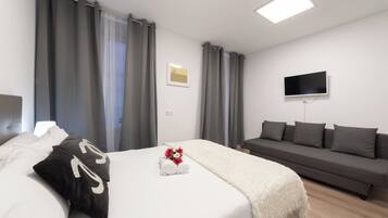 4 slaapkamers, een strijkplank/strijkijzer, reisbedje, gratis wifi