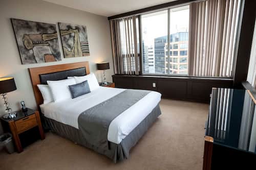 Appartement Ville, 2 grands lits | Fer et planche à repasser, accès au Wi-Fi (inclus), literie fournie