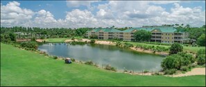 Situated by a serene body of water, this hotel offers stunning views and access to a golf course.