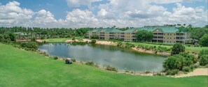 Situated by a serene body of water, this hotel offers stunning views and access to a golf course.