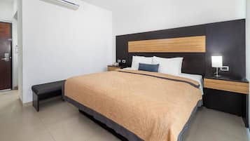Standard Room | In-room safe, desk, laptop workspace, blackout drapes