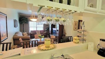 Condo, Multiple Beds, Kitchen | Living area | 42-inch flat-screen TV with digital channels