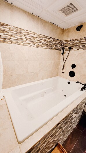 Shower, jetted tub, hair dryer, towels