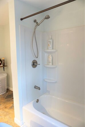 Shower, hair dryer, towels, soap