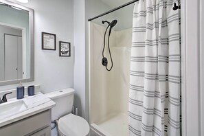 Shower, towels, soap, toilet paper