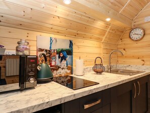 Cottage | Private kitchen | Fridge, electric kettle, toaster, cookware/dishes/utensils - The Shearer - Crossgate Luxury Glamping (Penrith)