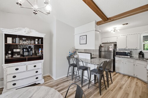 Charming 3BR retreat with a coffee lover's dream setup, fenced backyard, patio, and all the comforts of home.