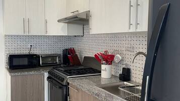 Fridge, microwave, oven, stovetop