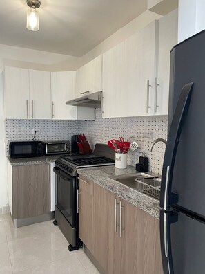 Fridge, microwave, oven, stovetop