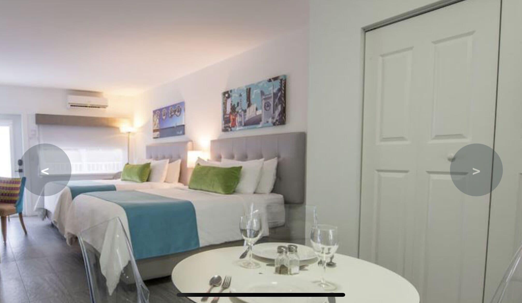 Junior Studio Suite | Living area | 24-inch flat-screen TV with cable channels, TV