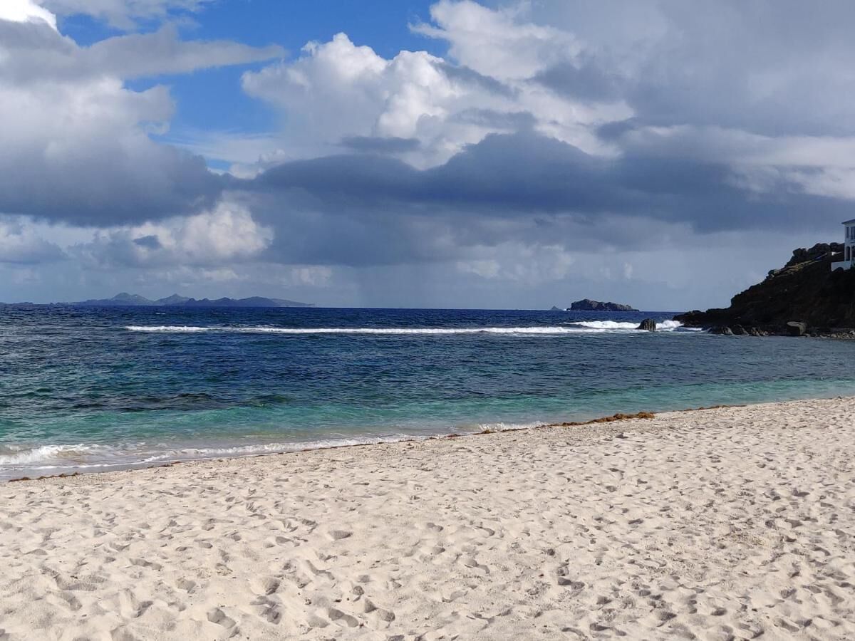 On the beach, sun loungers, beach towels